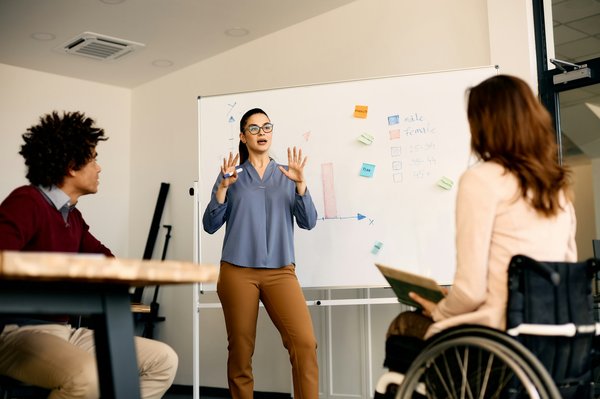 How can adaptive sports programs be implemented in schools to encourage participation from all students?